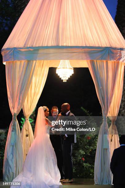 Chad Ochocinco and Evelyn Lozada marry at Le Chateau des Palmiers on July 4, 2012 in St. Maarten, Netherlands Antillies.