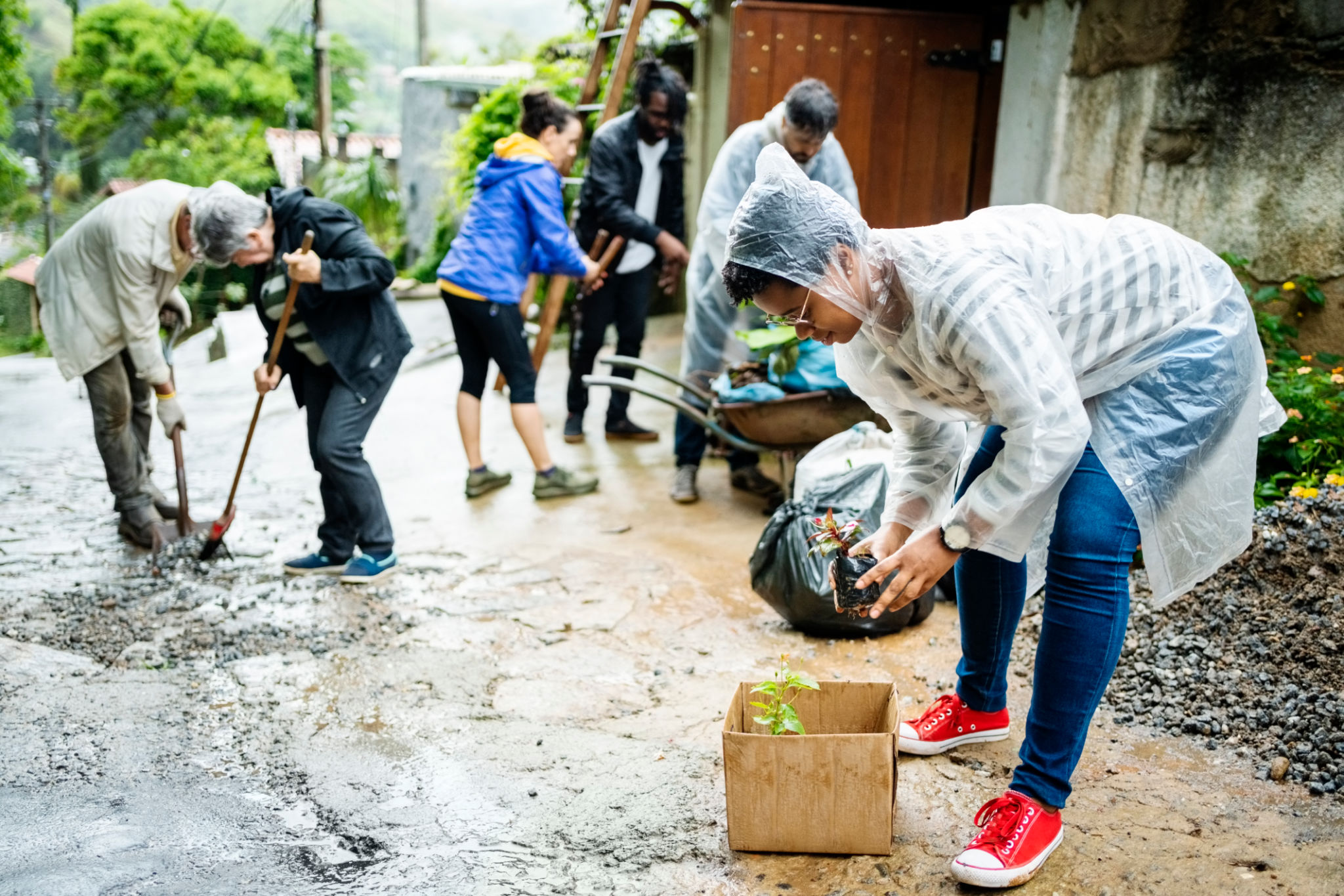 Diverse volunteers beautifying a community space