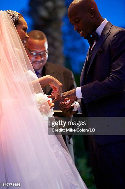 Chad Ochocinco and Evelyn Lozada marry at Le Chateau des Palmiers on July 4, 2012 in St. Maarten, Netherlands Antillies.