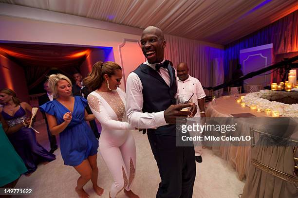 Chad Ochocinco dances during the reception for his wedding to Evelyn Lozada at Le Chateau des Palmiers on July 4, 2012 in St. Maarten, Netherlands...