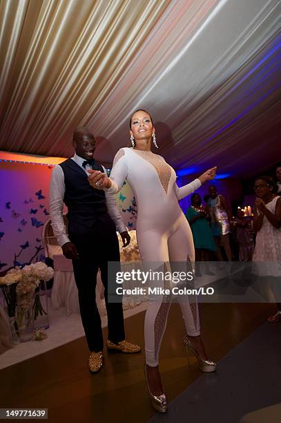 Chad Ochocinco dances during the reception for his wedding to Evelyn Lozada at Le Chateau des Palmiers on July 4, 2012 in St. Maarten, Netherlands...