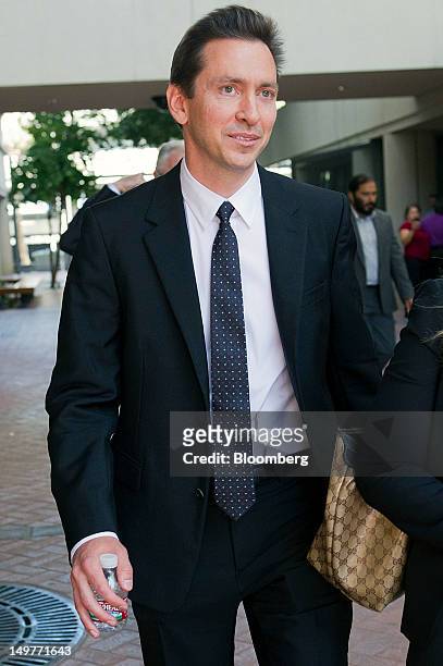 Scott Forstall, senior vice president of iPhone software for Apple Inc., leaves the Robert F. Peckham United States Courthouse in San Jose,...
