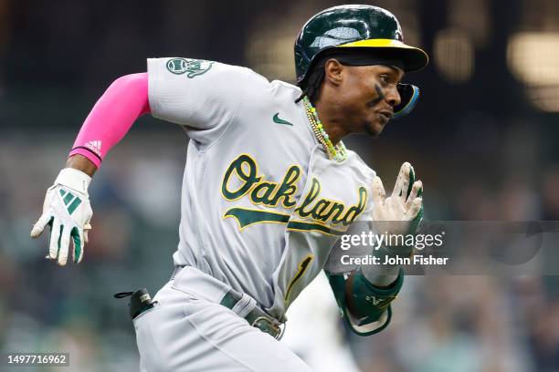 Esteury Ruiz of the Oakland Athletics runs after hitting a two-RBI double in the ninth inning against the Milwaukee Brewers at American Family Field...