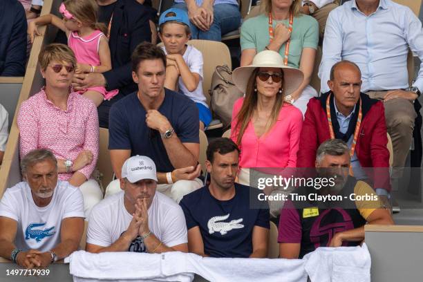 Former American football star Tom Brady and Jelena Djokovic, wife of Novak Djokovic of Serbia watching during his match against Casper Ruud of Norway...