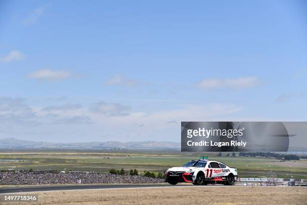 Denny Hamlin, driver of the Sport Clips Haircuts Toyota, drives during the NASCAR Cup Series Toyota / Save Mart 350 at Sonoma Raceway on June 11,...