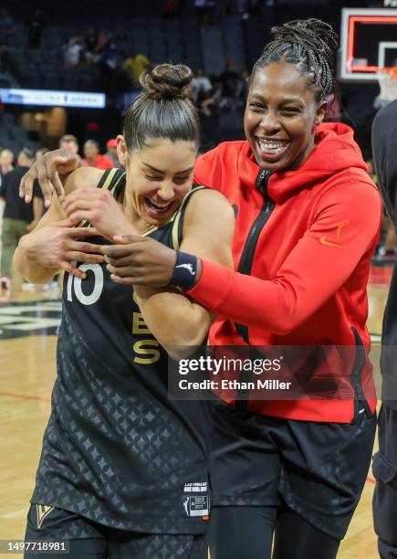 Kelsey Plum and Chelsea Gray of the Las Vegas Aces run off the court after the team's 93-80 victory over the Chicago Sky at Michelob ULTRA Arena on...