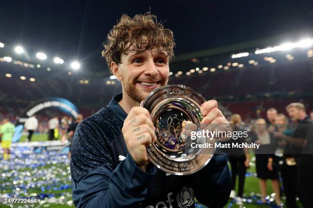 Tom Grennan of England celebrates with the Player of the Match trophy following Soccer Aid for Unicef 2023 at Old Trafford on June 11, 2023 in...