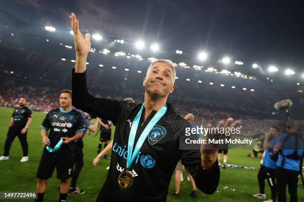 Hernan Crespo of World XI celebrates with his medal following Soccer Aid for Unicef 2023 at Old Trafford on June 11, 2023 in Manchester, England.