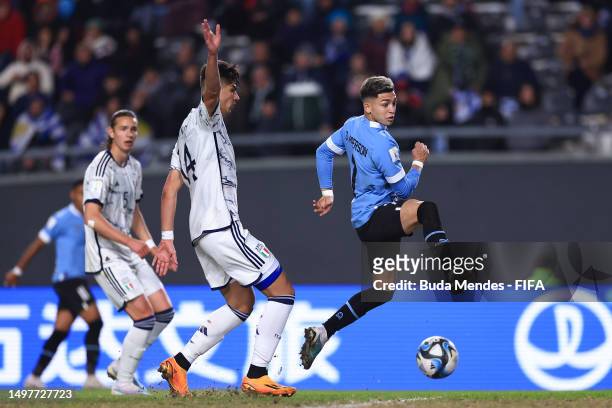 Gabriele Guarino of Italy battles for the ball with Anderson Duarte of Uruguay during the FIFA U-20 World Cup Argentina 2023 Final match between...