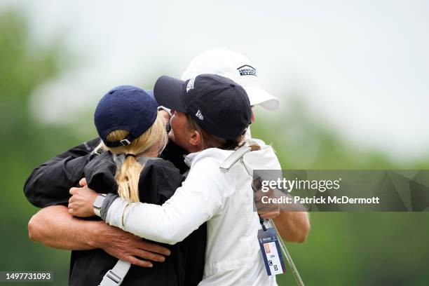 Steve Stricker of United States celebrates with his daughters on the 18th green after winning of the American Family Insurance Championship at...