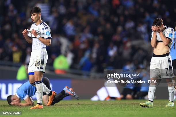Gabriele Guarino and Niccolo Pisilli of Italy look dejected following the team's defeat during the FIFA U-20 World Cup Argentina 2023 Final match...
