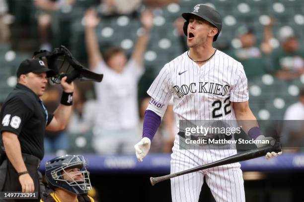 Nolan Jones of the Colorado Rockies celebrates after hitting a walk off home run against the San Diego Padres in the ninth inning at Coors Field on...