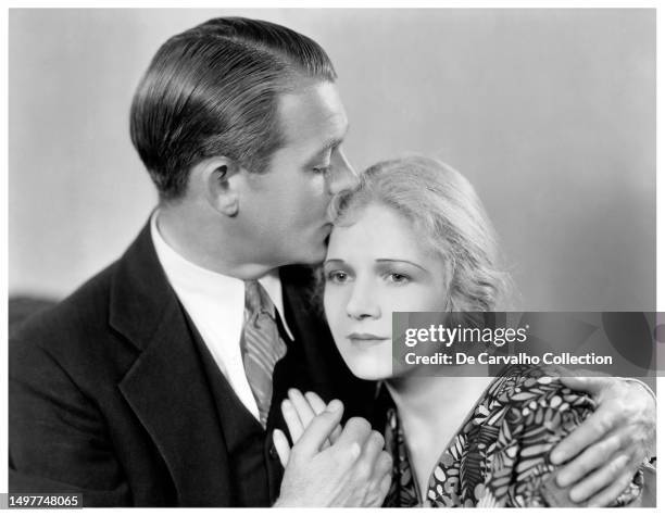 Publicity portrait of actors Robert Ames and Ann Harding in the film 'Holiday' United States.