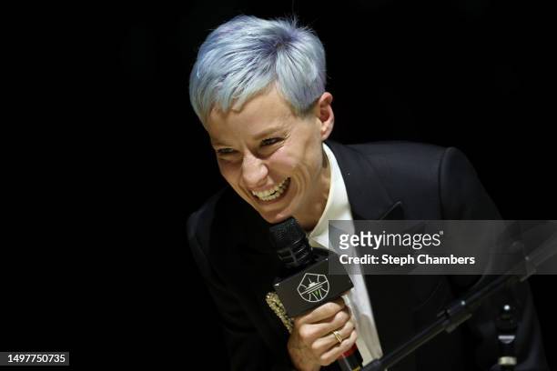Megan Rapinoe sings to her partner Sue Bird during Bird's jersey retirement ceremony after the game between the Seattle Storm and the Washington...