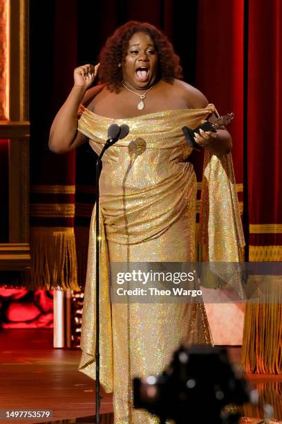 Alex Newell accepts the award for Best Featured Actor in a Musical for “Shucked” onstage during The 76th Annual Tony Awards at United Palace Theater...