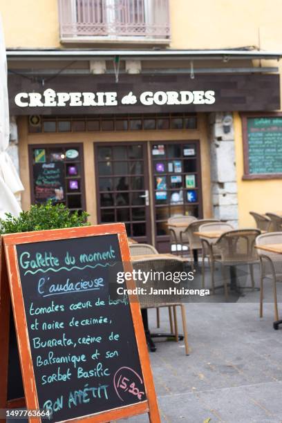 grenoble, france: handwritten blackboard menu outside creperie - cafe creperie stock pictures, royalty-free photos & images