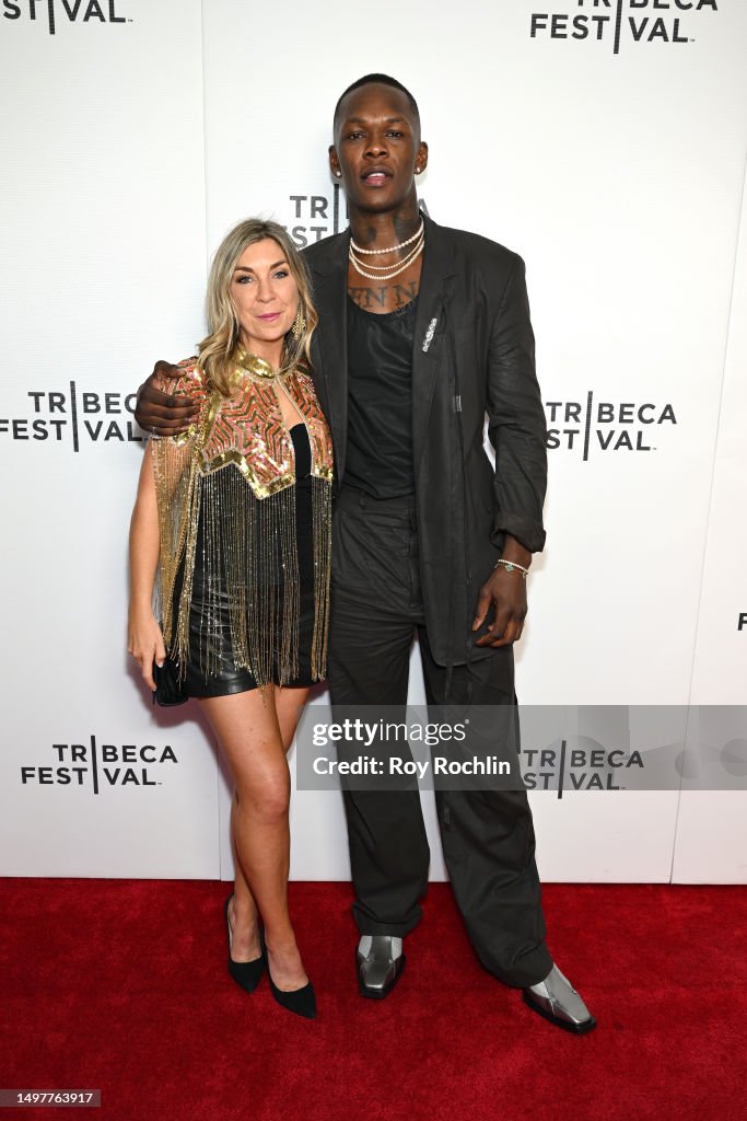 Styylebender Zoe Mcintosh and Israel Adesanya and Tim Simpson attend the... News ...