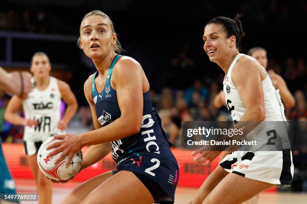 Liz Watson of the Vixens in action against Ash Brazill of the Magpies during the round 13 Super Netball match between Melbourne Vixens and...