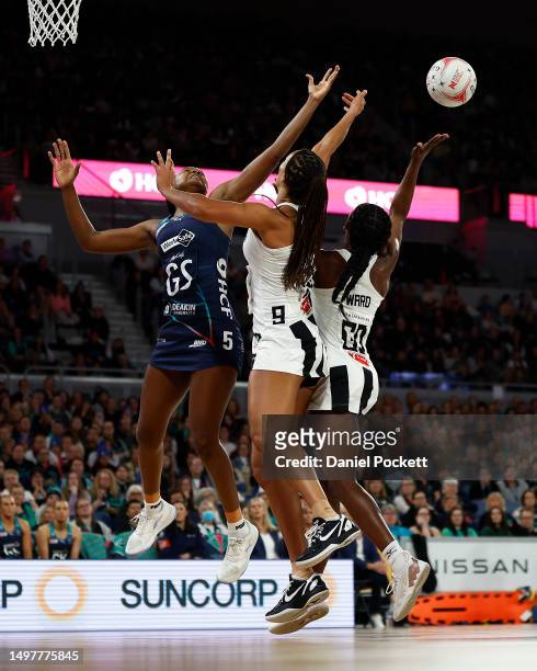 Mwai Kumwenda of the Vixens, Geva Mentor of the Magpies and Jodi-Ann Ward of the Magpies contest the ball during the round 13 Super Netball match...
