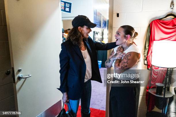 Faith Hill and Elle King seen backstage for night 4 of the 50th CMA Fest at Nissan Stadium on June 11, 2023 in Nashville, Tennessee.