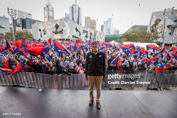 Neale Daniher poses in front of the huge crowd before the "Walk to the G" ahead of the AFL match between Melbourne Demons and Collingwood Magpies at...