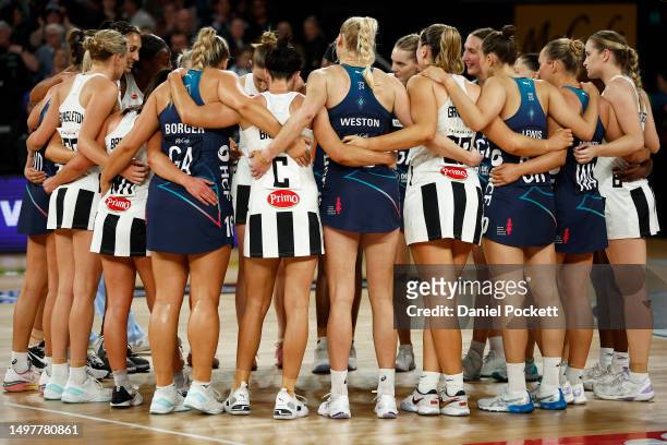 Both sides huddle after the round 13 Super Netball match between Melbourne Vixens and Collingwood Magpies at John Cain Arena, on June 12 in...