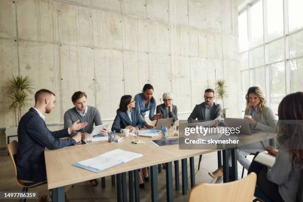 business team working on a meeting in the office. - boardroom stock pictures, royalty-free photos & images