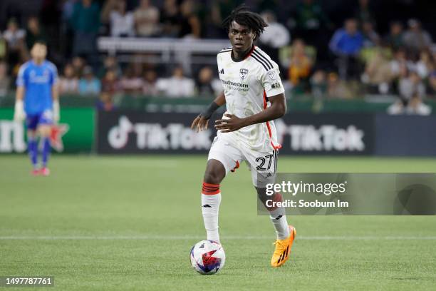 Herbert Endeley of the FC Dallas carries the ball during the second half against the Portland Timbers at Providence Park on June 11, 2023 in...