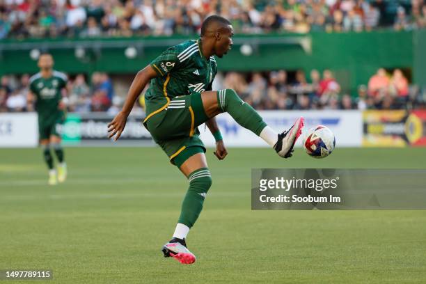 Juan Mosquera of the Portland Timbers controls the ball during the first half against the FC Dallas at Providence Park on June 11, 2023 in Portland,...