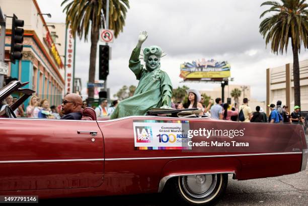 Participant dressed as the Statue of Liberty rides in the ACLU vehicle, designated as 'Community Grand Marshal', during the 2023 LA Pride Parade in...