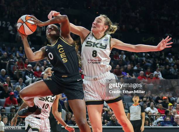 Jackie Young of the Las Vegas Aces is fouled as she drives to the basket by Alanna Smith of the Chicago Sky in the third quarter of their game at...