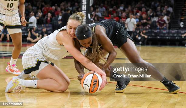 Alanna Smith of the Chicago Sky and Jackie Young of the Las Vegas Aces go after a loose ball in the third quarter of their game at Michelob ULTRA...