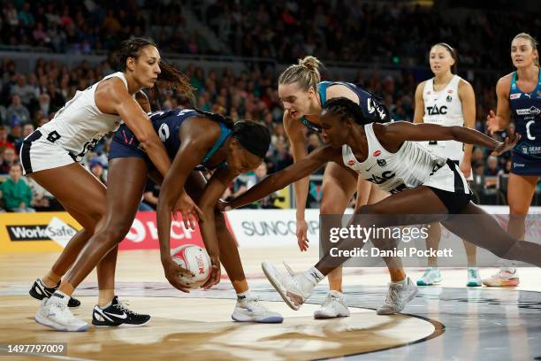 Mwai Kumwenda of the Vixens and Jodi-Ann Ward of the Magpies contest the ball during the round 13 Super Netball match between Melbourne Vixens and...