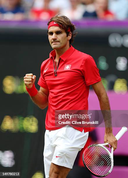 Roger Federer of Switzerland celebrates a set point against Juan Martin Del Potro of Argentina in the Semifinal of Men's Singles Tennis on Day 7 of...