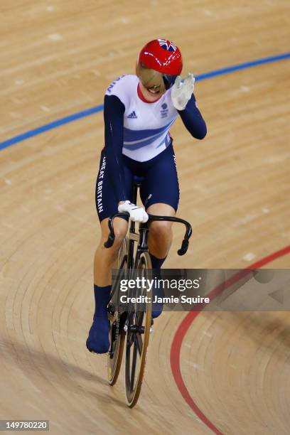 Victoria Pendleton of Great Britain celebrates after qualifying in her heat during the Women's Keirin Track Cycling first round on Day 7 of the...
