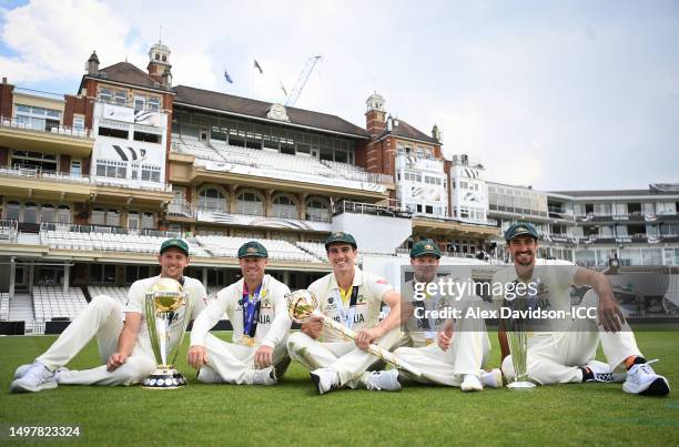 Josh Hazlewood, David Warner, Pat Cummins, Steve Smith and Mitchell Starc of Australia pose with the ICC World Cup, ICC World Test Championship Mace...