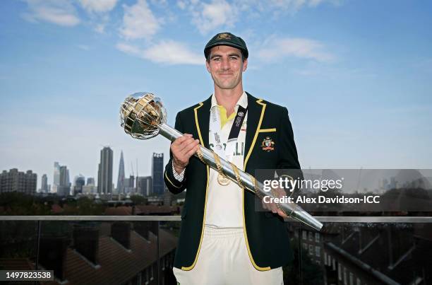 Pat Cummins of Australia poses with the World Test Championship Mace after day five of the ICC World Test Championship Final between Australia and...