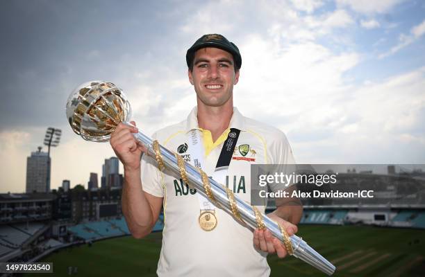 Pat Cummins of Australia poses with the World Test Championship Mace after day five of the ICC World Test Championship Final between Australia and...