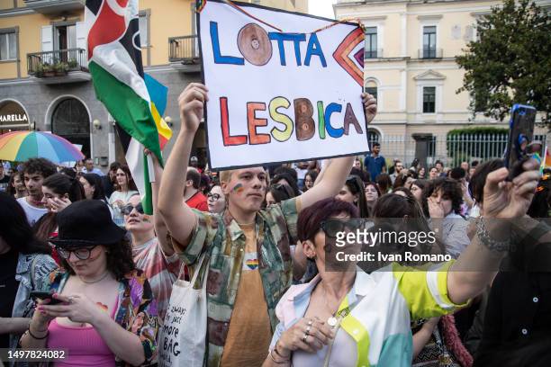 Person holds up a sign that reads: "Lotta lesbica" during the 2023 Irpinia Pride Parade for LGBTQ+ rights on June 10, 2023 in Avellino, Italy. On...