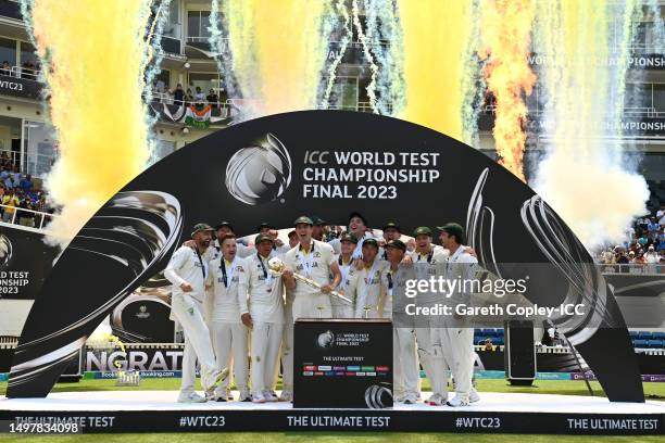 Pat Cummins of Australia lifts the ICC World Test Championship Mace on day five of the ICC World Test Championship Final between Australia and India...