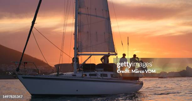 cruise, travel and luxury with people on a boat in the ocean for adventure during summer vacation or holiday. relax, ship and sailing with crew of friends on a yacht for tourism at sea - veleiro imagens e fotografias de stock