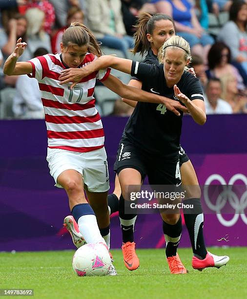 Tobin Heath of USA battles with Katie Hoyle of New Zealand during the Women's Football Quarter Final match between United States and New Zealand, on...