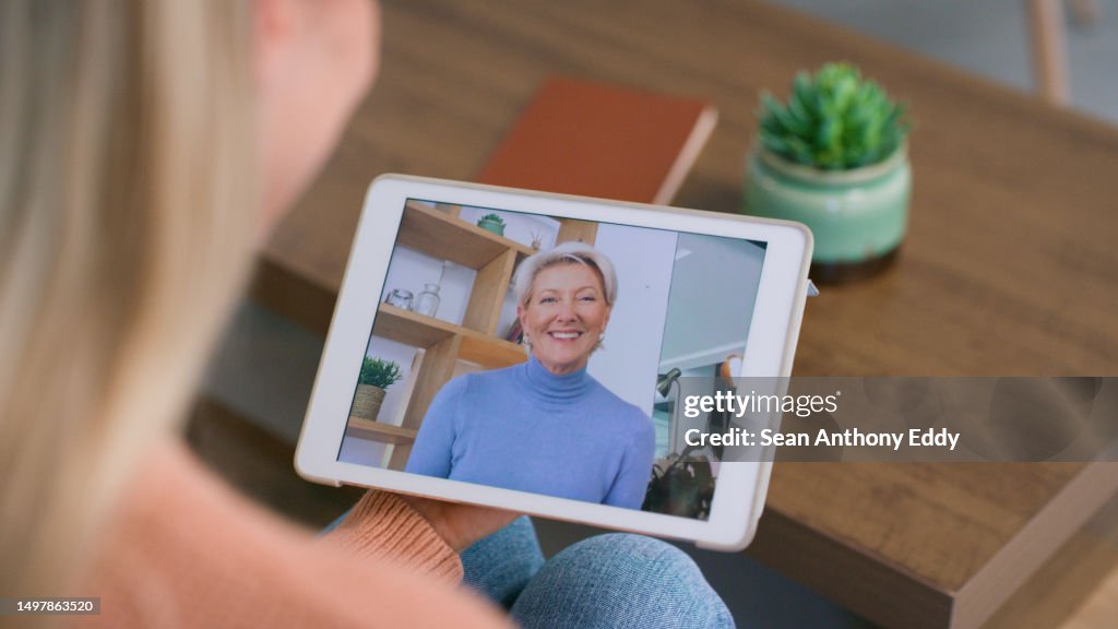 Video call, screen and psychologist woman in psychology, mental health advice and online tablet meeting. Senior counseling, professional people and virtual therapy, consultation and happy client chat