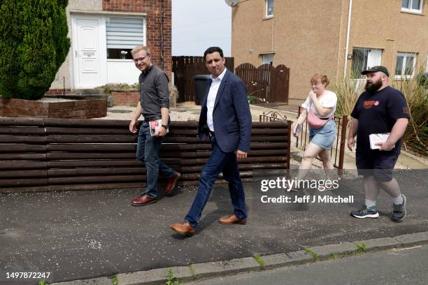 Anas Sarwar, Leader of the Scottish Labour Party and Scottish Labour’s candidate for Rutherglen and Hamilton West, Michael Shanks during door...