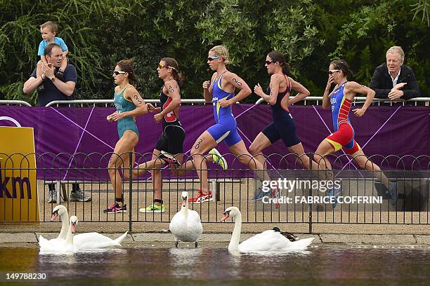 Australia's Erin Densham, Switzerland's Nicola Spirig, Sweden's Lisa Norden, Britain's Helen Jenkins and Spain's Ainhoa Murua run during the women's...