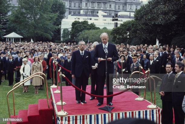 President Gerald Ford welcomes Japanese Emperor Hirohito at the White House in Washington, October 2nd 1975. Empress Kojun and First Lady Betty Ford...