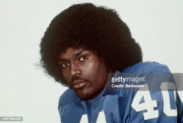 American football player Sonny Collins posing in his uniform at the University of Kentucky where he plays college football, 1975.