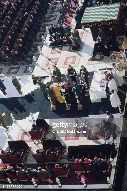 Aerial view of the funeral mass for General Francisco Franco at the Royal Palace in Madrid, with King Juan Carlos and Queen Sofia of Spain in...