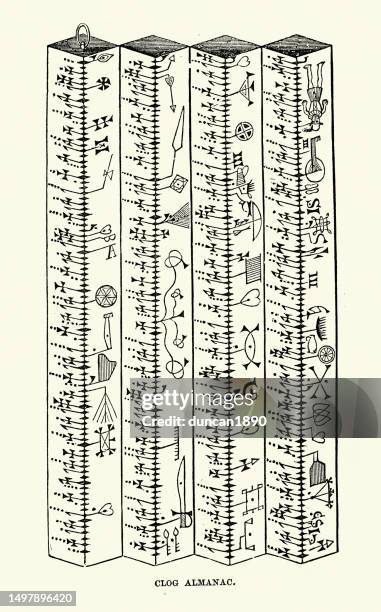 clog almanac a calendar for the illiterate, a block of wood on which weekdays, sundays and saints' days are denoted by curved notches and symbols - almanac publication stock illustrations