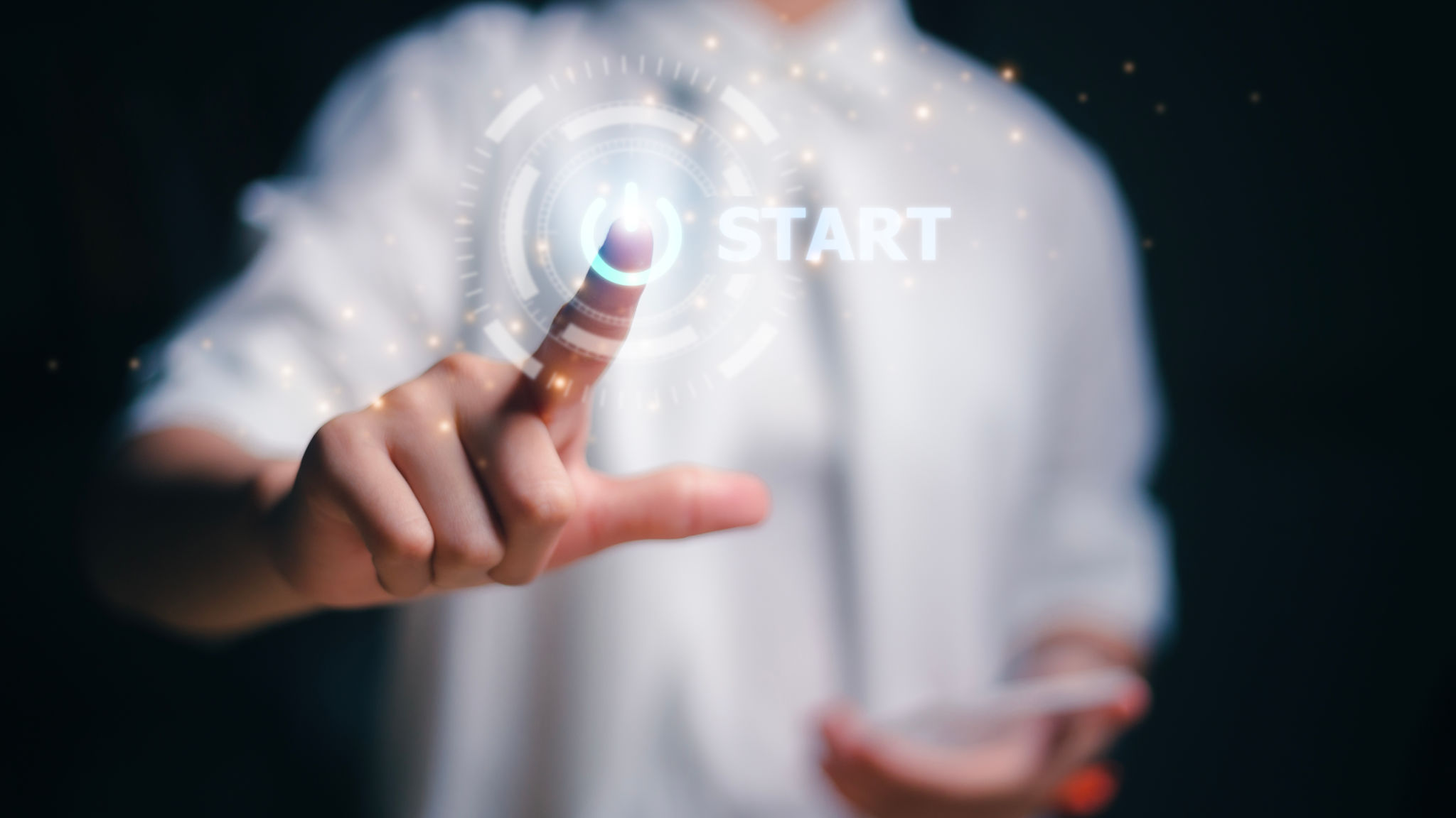 Women hand pressing the start button. To make a new start in life, business, education, or career concept. Women hand pressing the start button. To make a new start in life, business, education, or career concept.